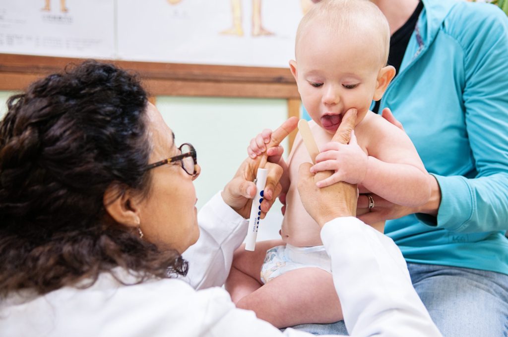 doctor, baby, and mom